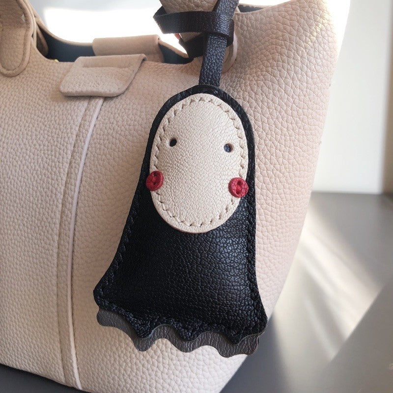 Customized delivery within 15 days, handmade genuine leather faceless men's bags, pendants, jewelry bags, accessories, creative couple gifts, faceless men's keychains