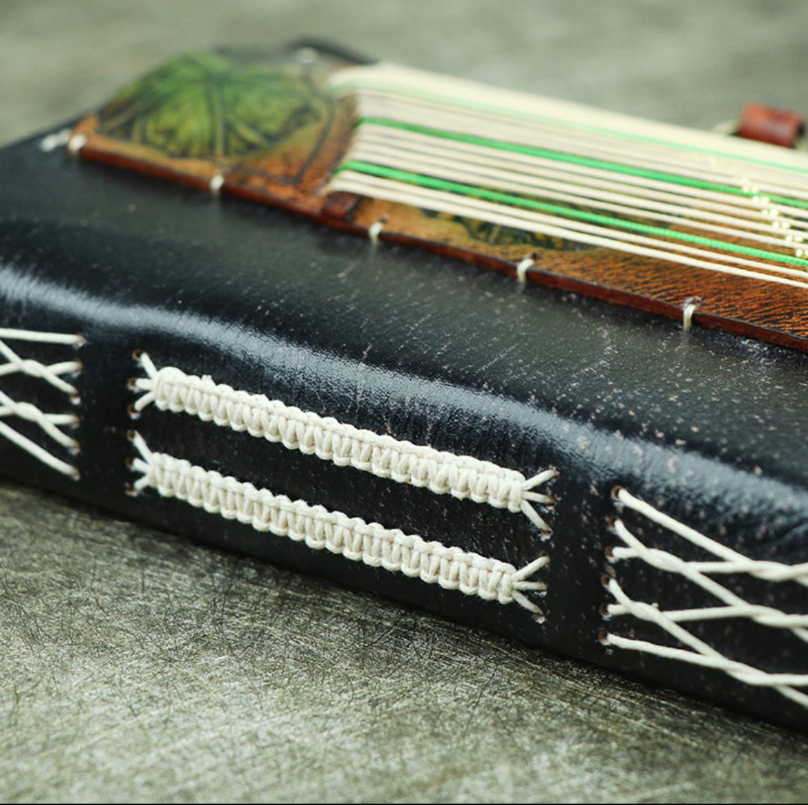 Customized delivery in 15 days Genuine leather guzheng handbook handmade thickened cowhide notebook loose-leaf a6 musical instrument creative diary notepad gift guzheng loose-leaf book A6